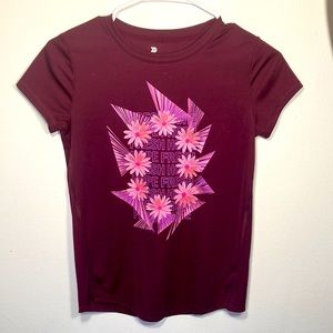 A youth size maroon sports t-shirt